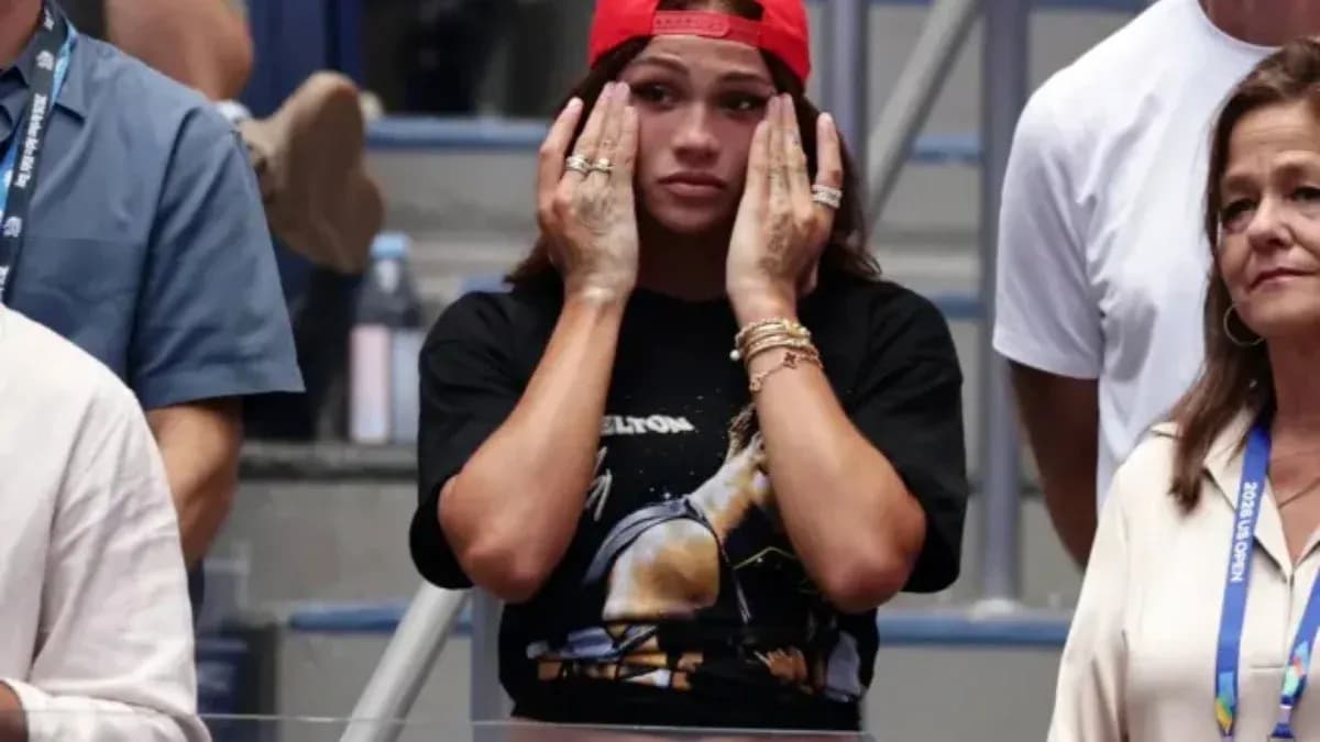 Spectators watching tense moment at tennis match