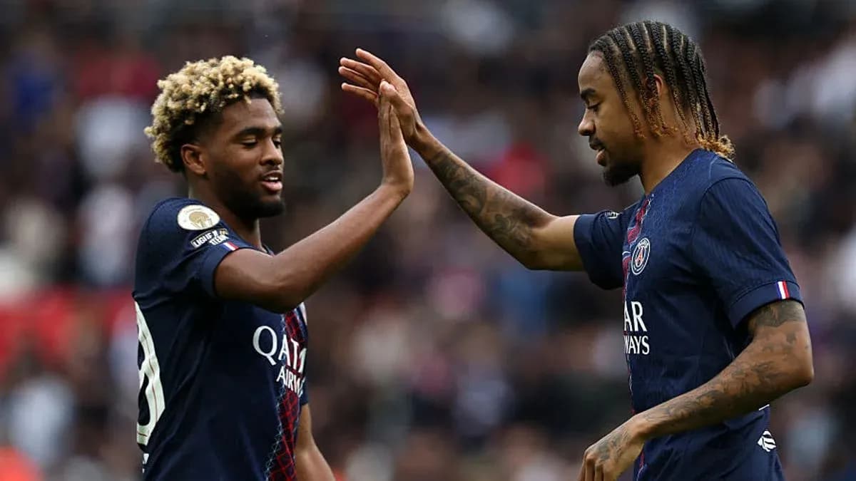 PSG players celebrating with a high five
