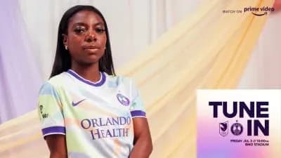 Football player wearing Orlando Pride jersey