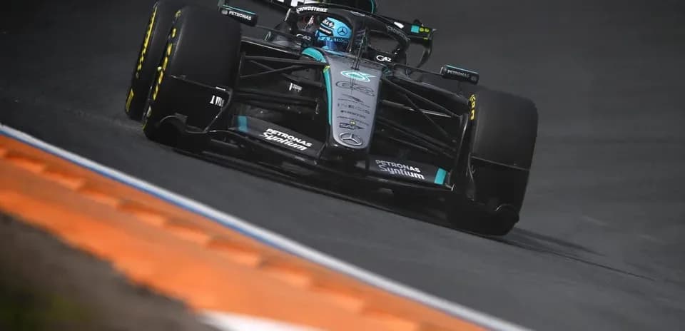 Mercedes Formula 1 car navigating a track turn