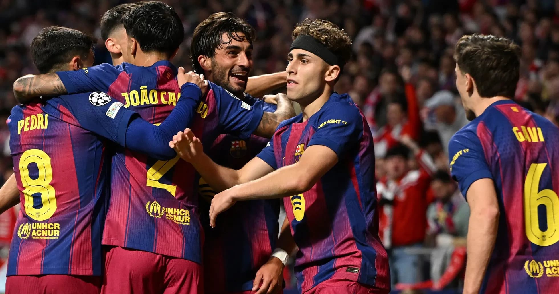 Barcelona players celebrating a goal during match