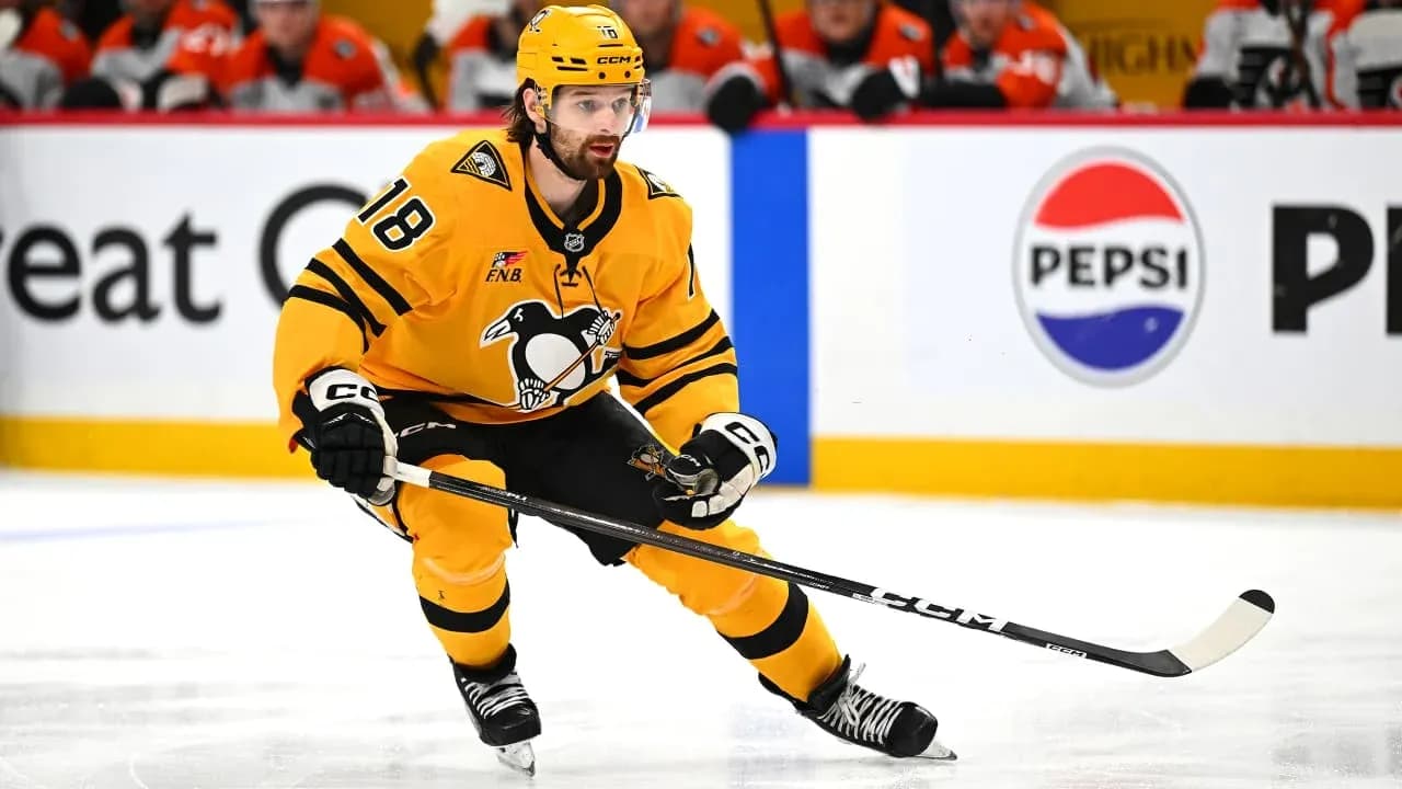Hockey player skating during a game on ice