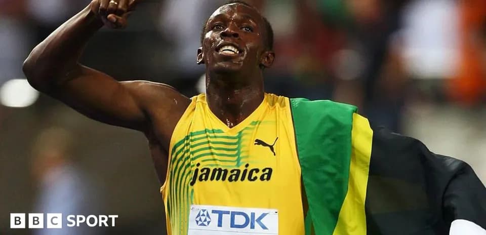 Usain Bolt celebrating after winning a race