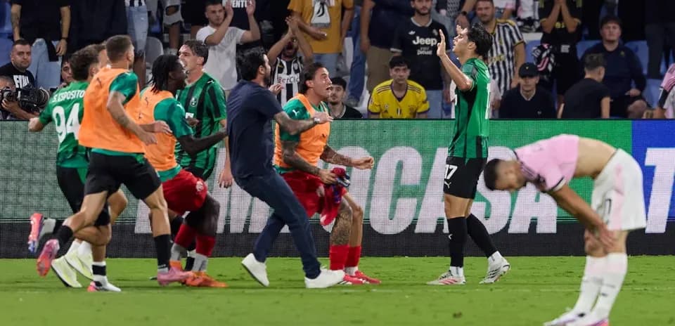 Sassuolo players celebrating after scoring a goal