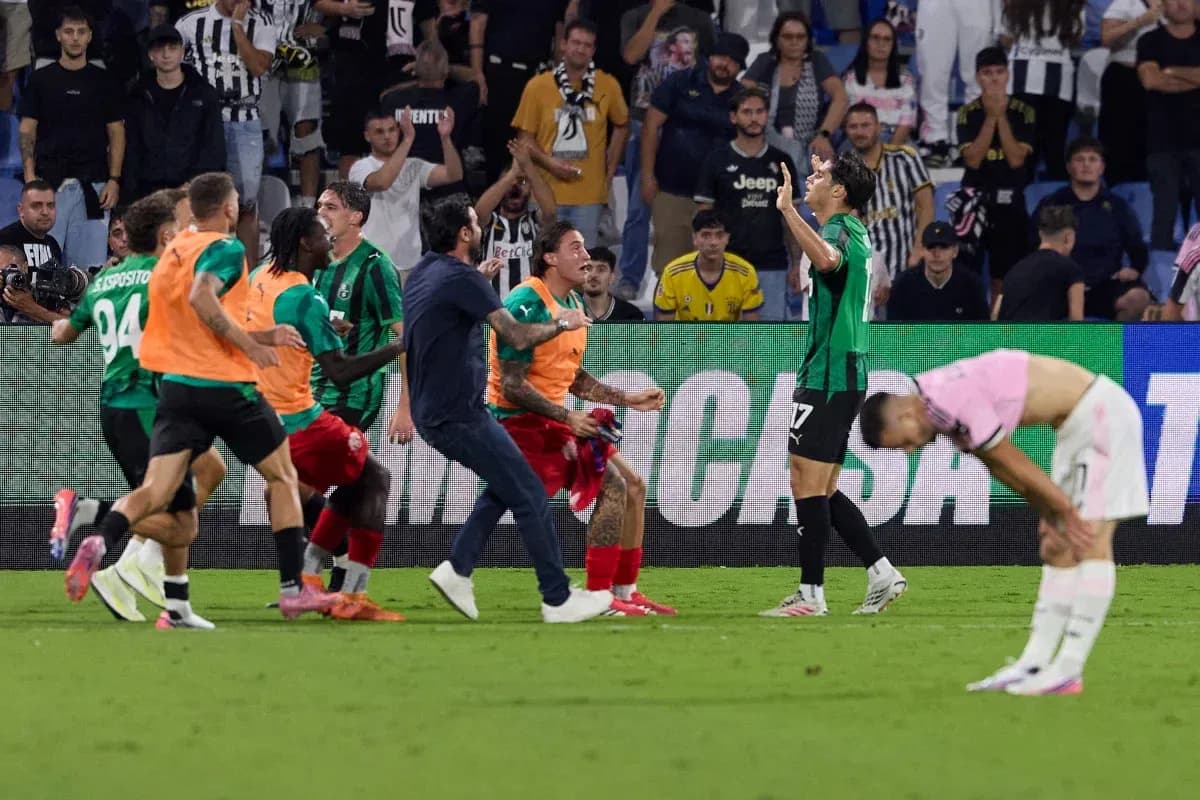 Sassuolo players celebrating after scoring a goal