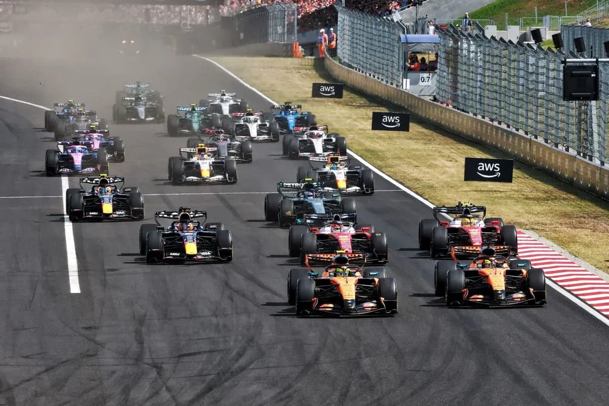 Formula 1 cars racing on track during competition