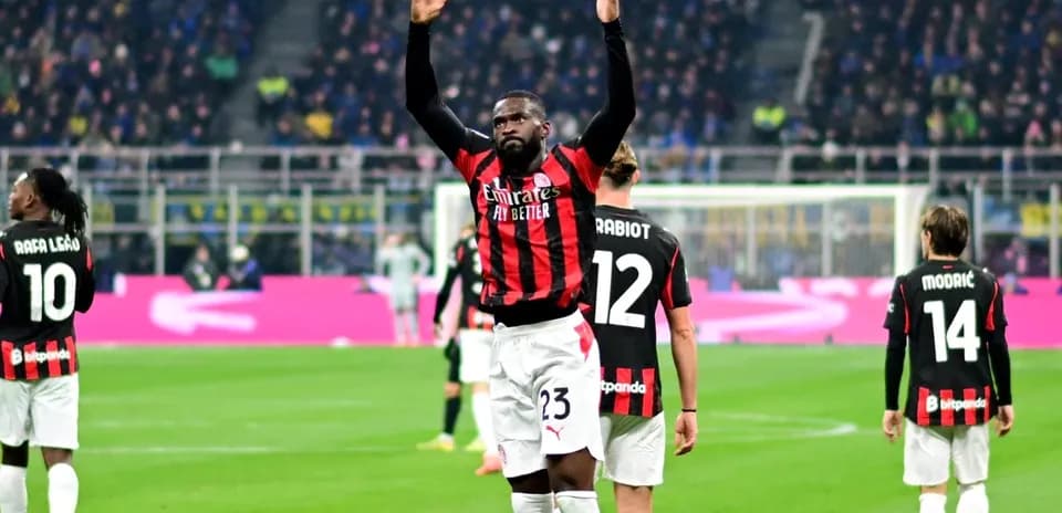 AC Milan players celebrating during a match