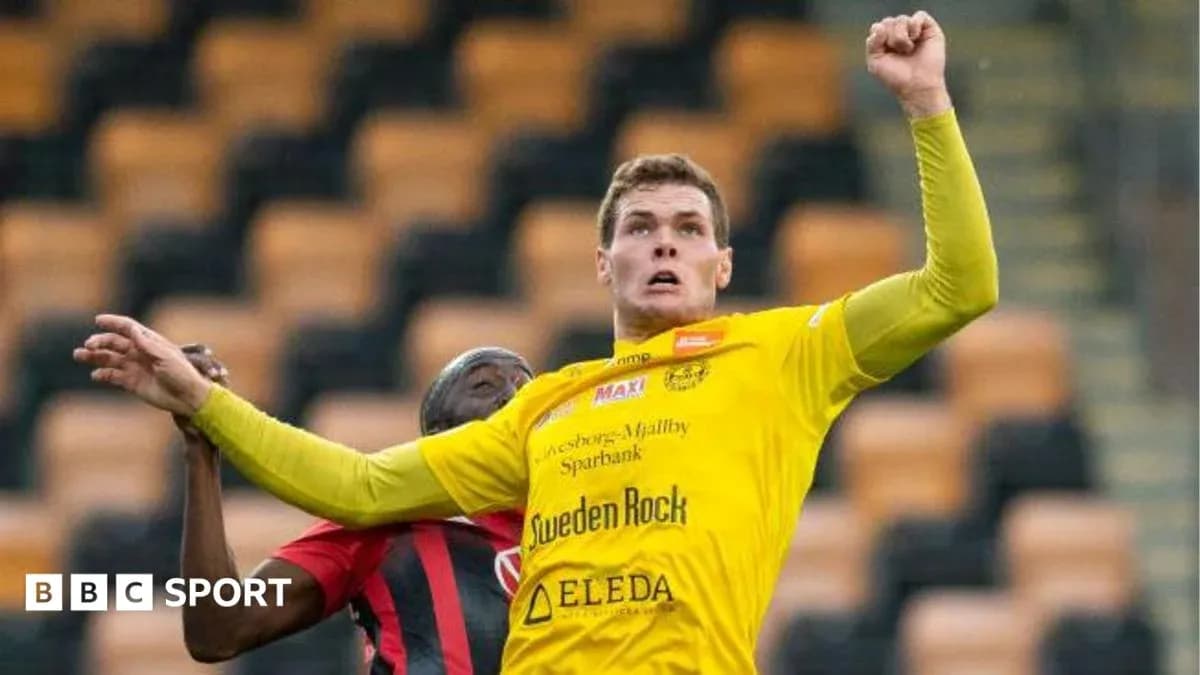Player jumping for the ball during a match