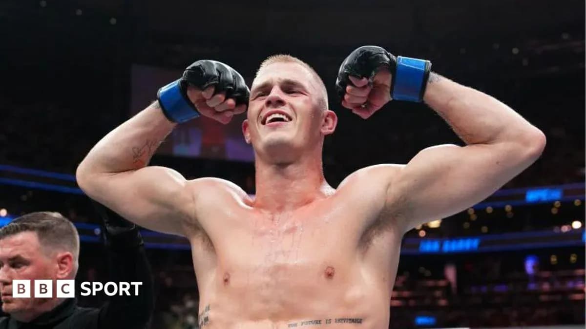 Boxer celebrating victory in the ring