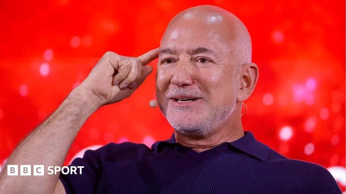 Speaker gesturing during a discussion on stage
