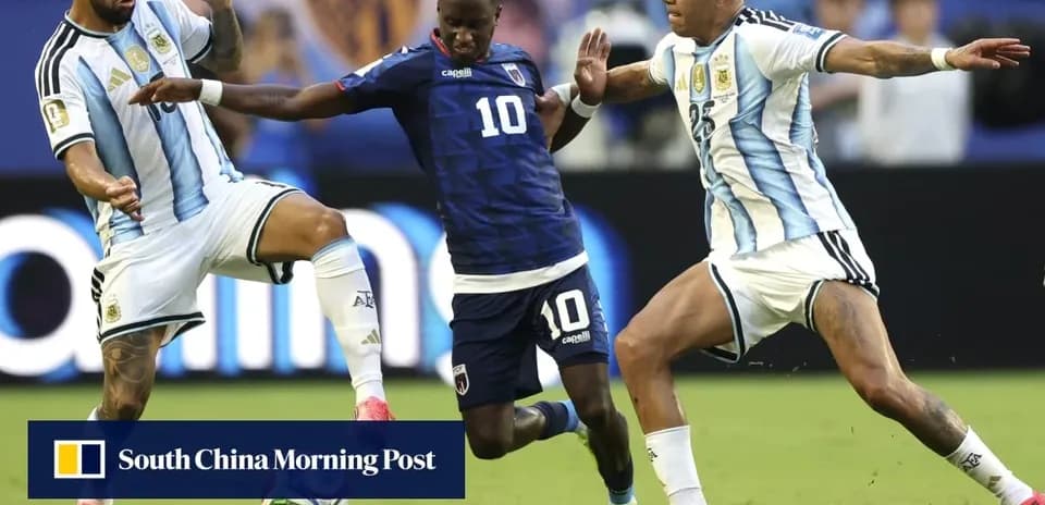 Three players contesting the ball during a match