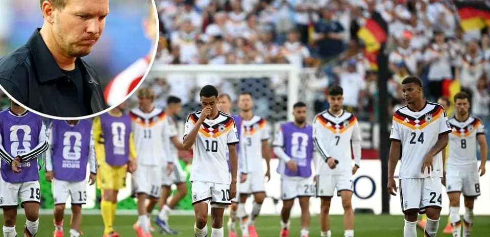 German team walking off the pitch after defeat