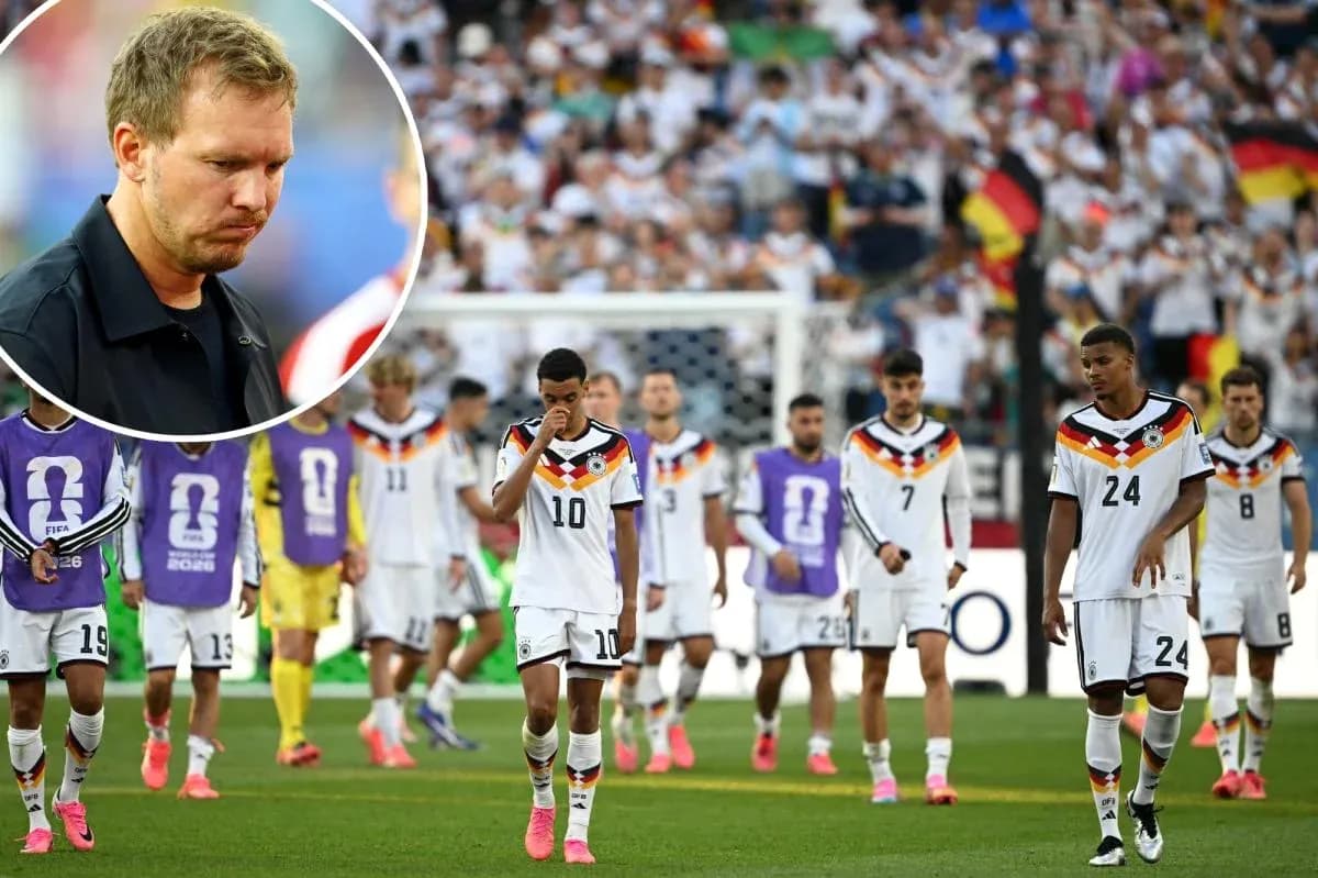 German team walking off the pitch after defeat
