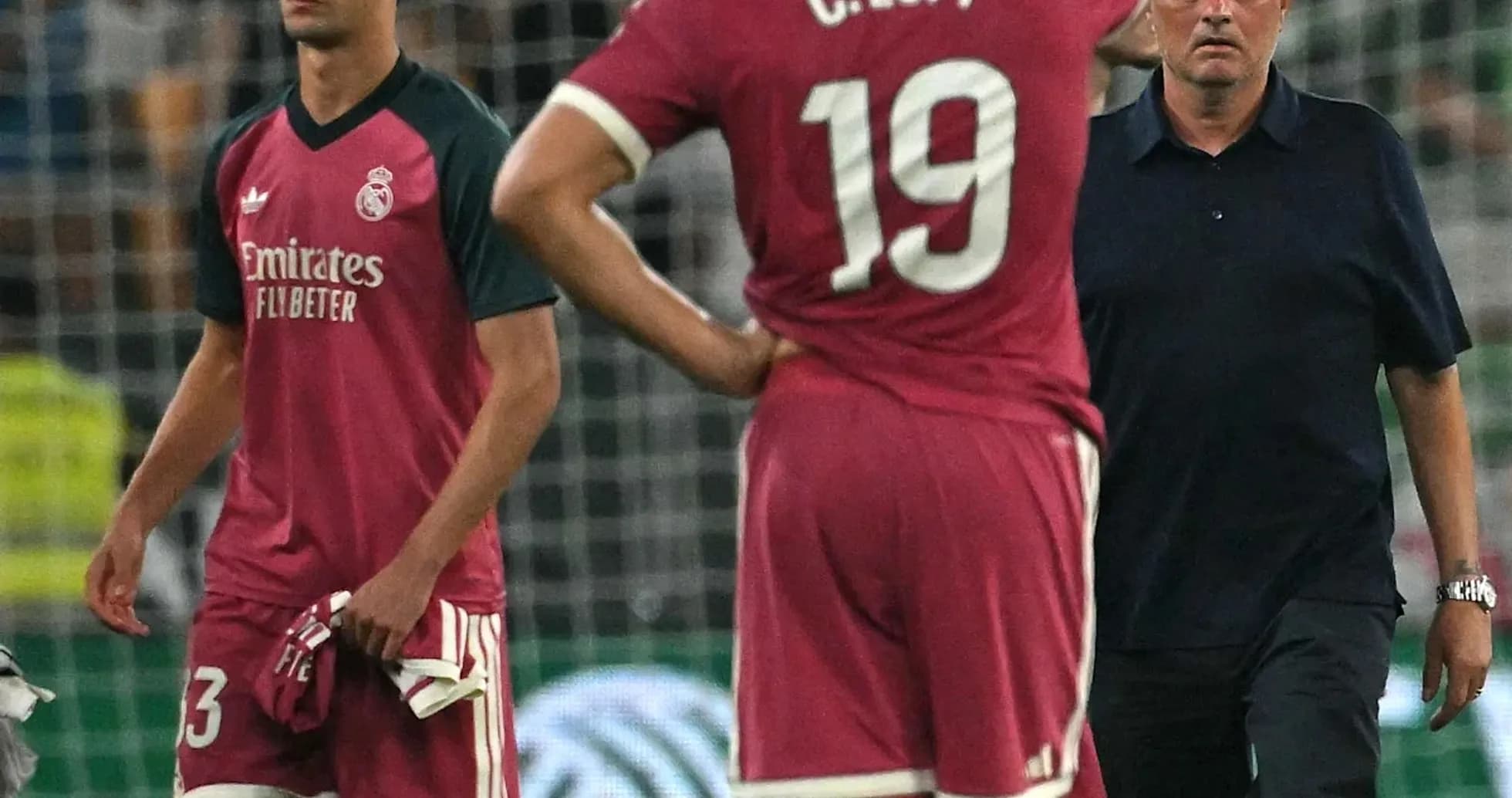Real Madrid players and coach during match disappointment