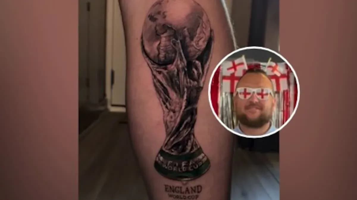 Tattoo of FIFA World Cup trophy on leg