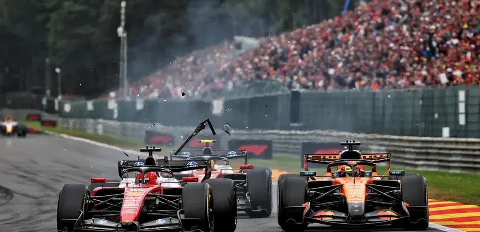 Formula 1 cars racing with debris on track