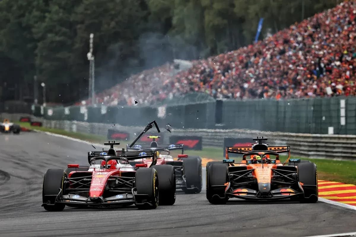 Formula 1 cars racing with debris on track