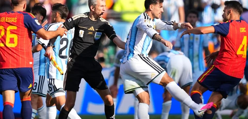 Players clashing during a tense moment in match