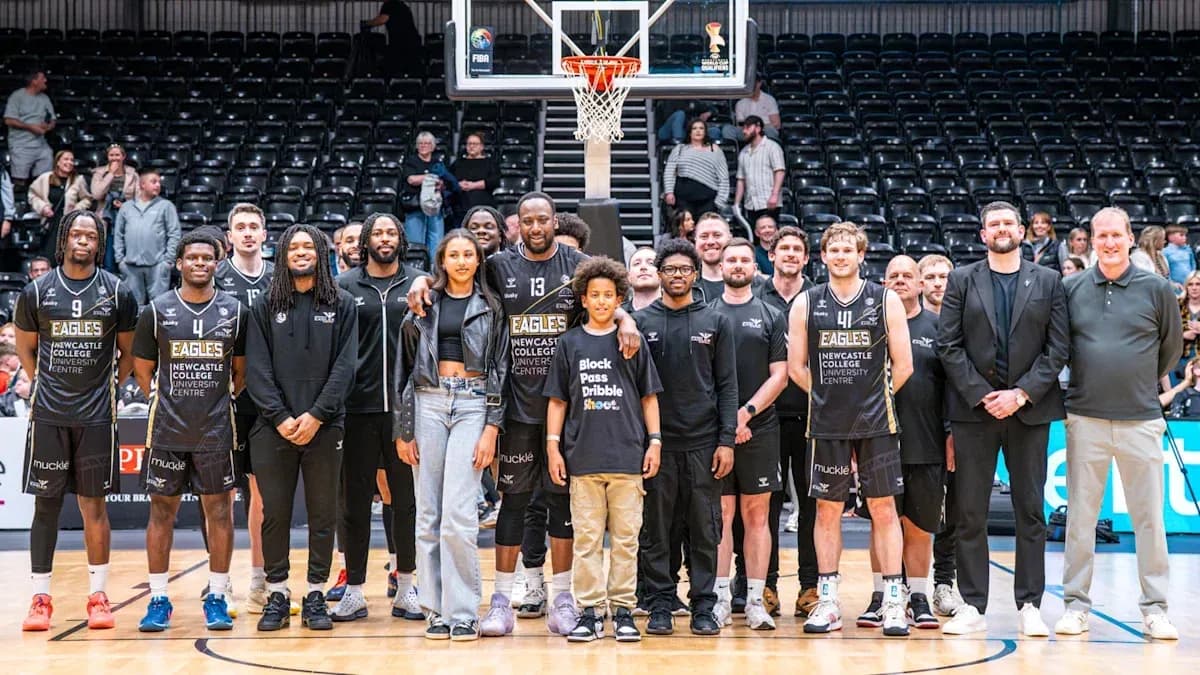 Newcastle Eagles basketball team posing on court