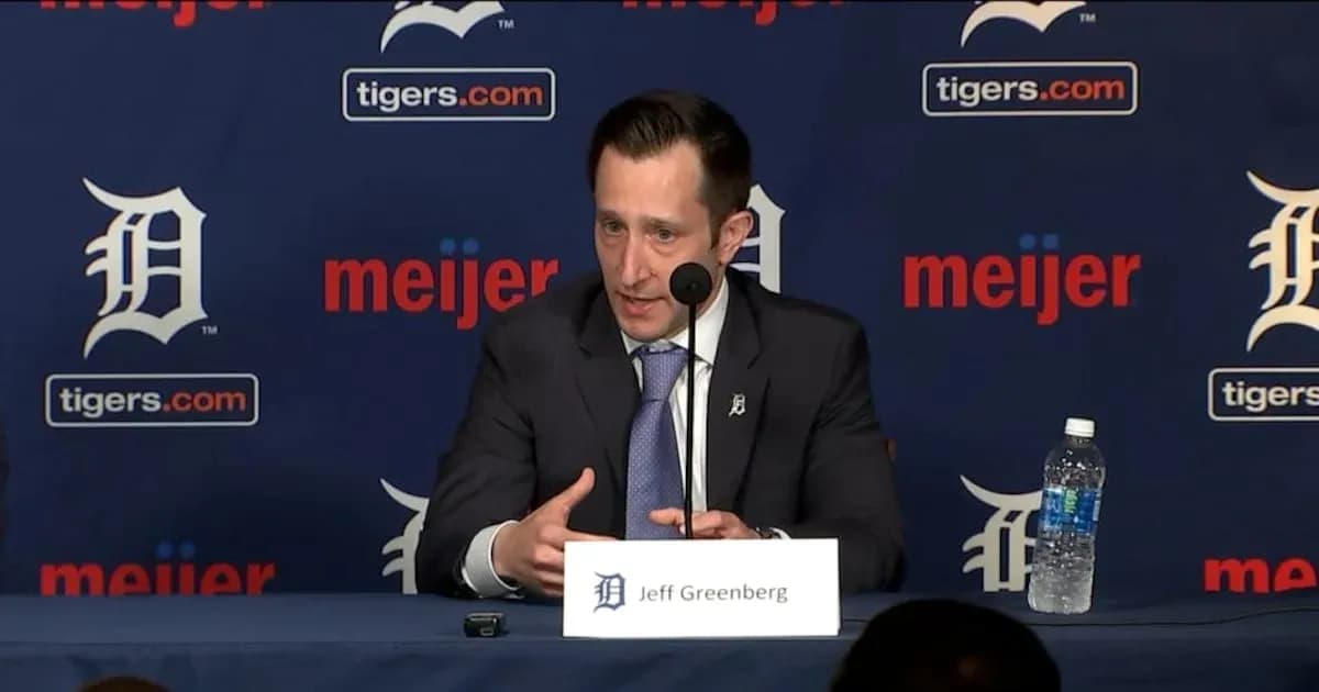 Jeff Greenberg speaking at press conference podium