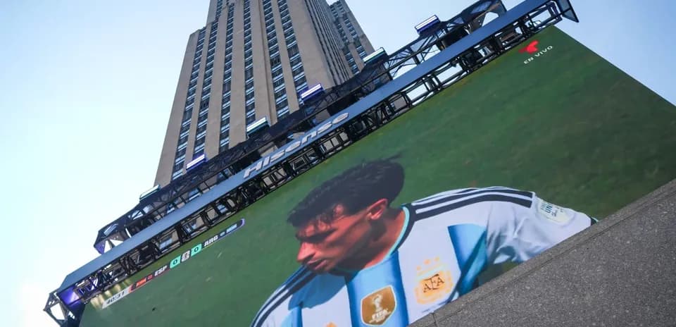 Giant screen displaying Argentina player during match
