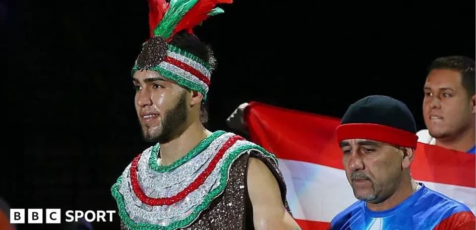 Boxer entering the ring with supporters and flag