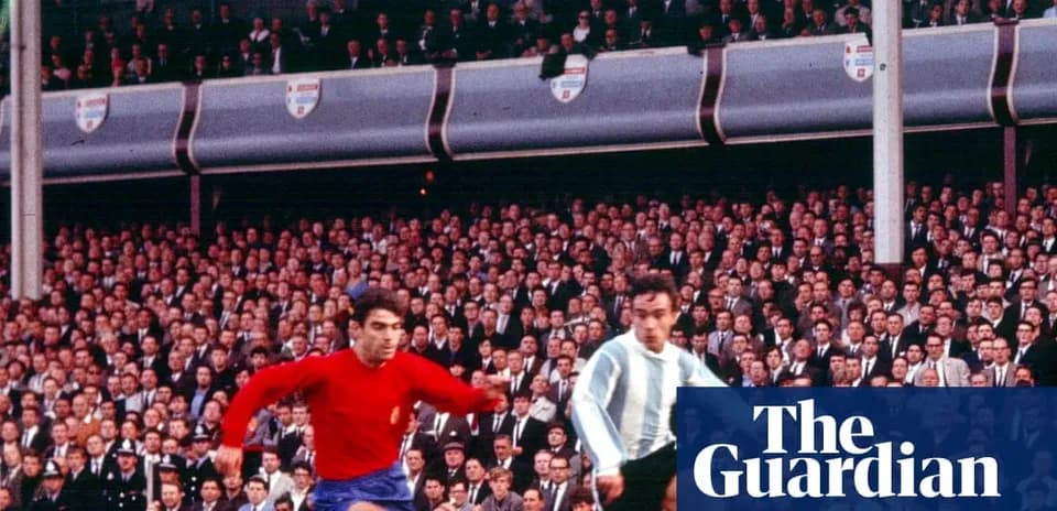 Two players competing during historic football match