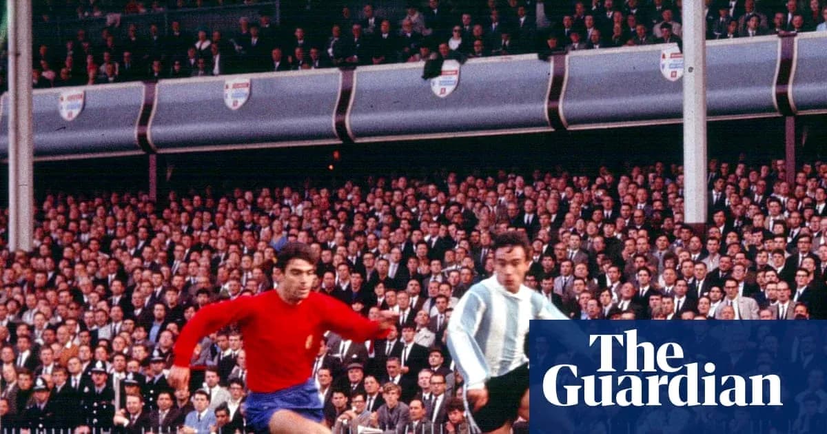 Two players competing during historic football match