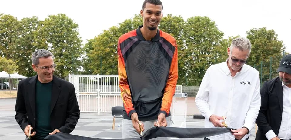 Ceremony for opening basketball court with officials