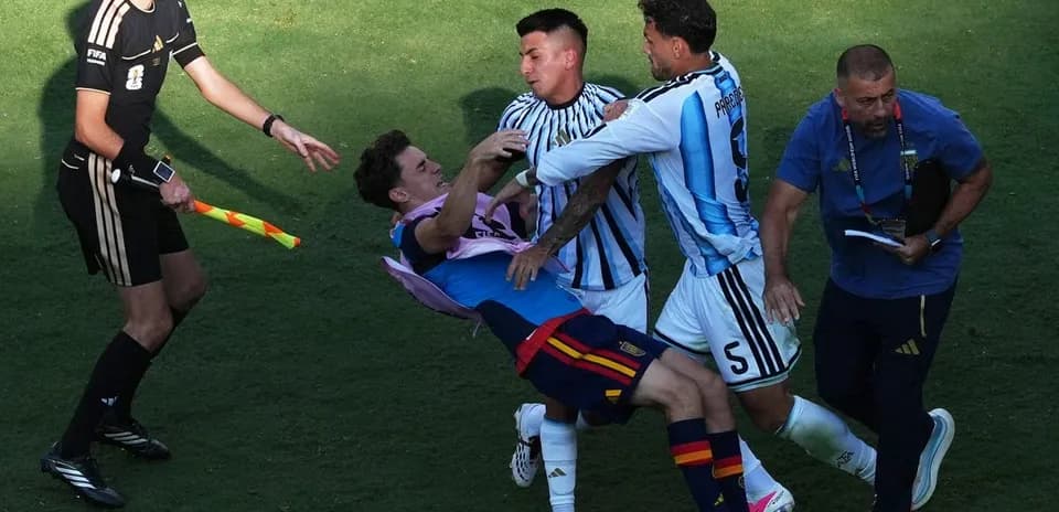 Players clashing during a heated moment in match