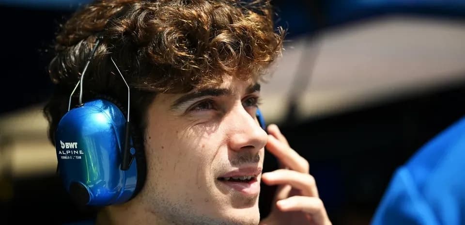 Young man wearing headphones and talking on phone