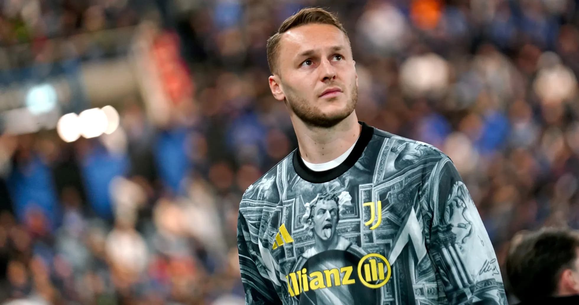 Goalkeeper in Juventus jersey during match warm-up