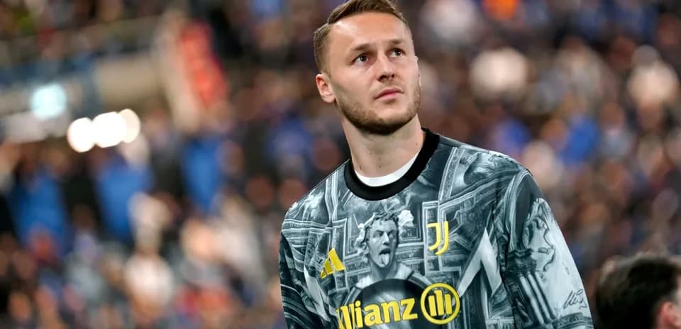 Goalkeeper in Juventus jersey during match warm-up