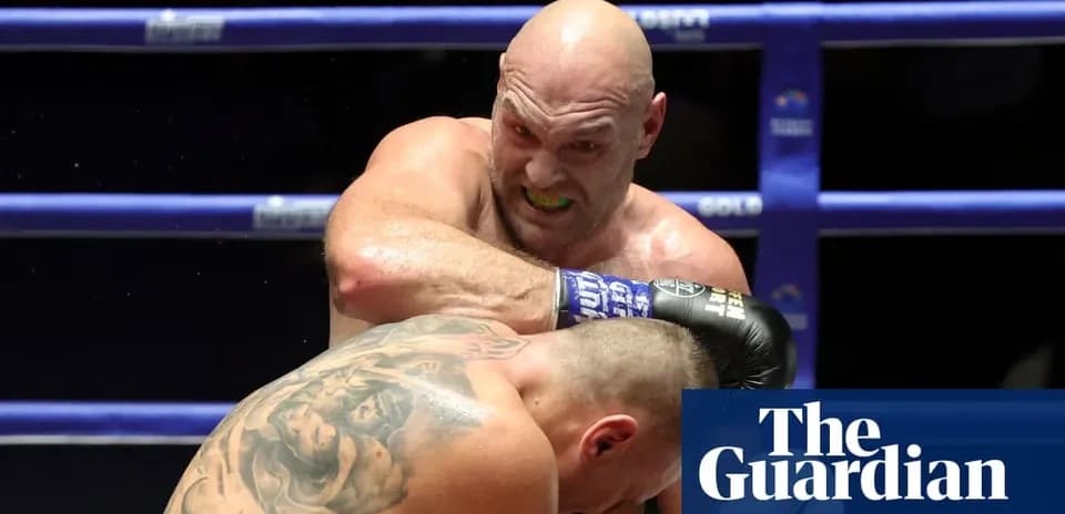 Boxer delivering a punch to opponent in ring