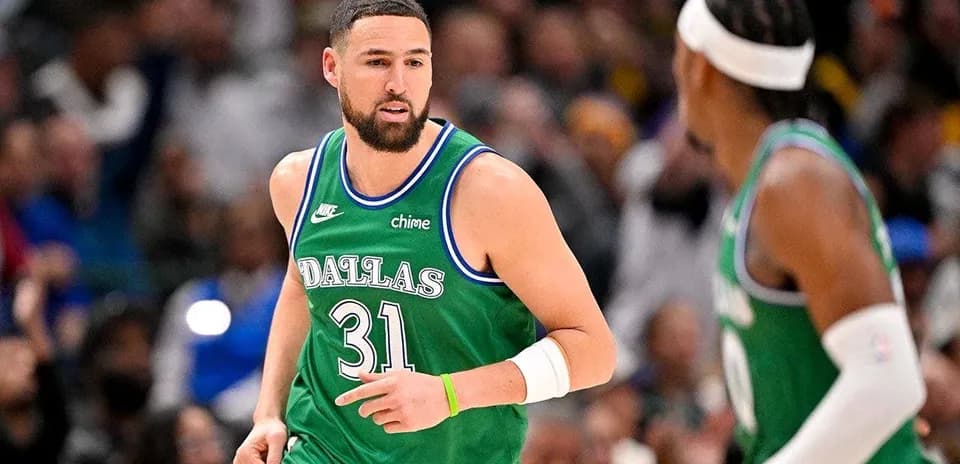 Basketball player in Dallas uniform during game