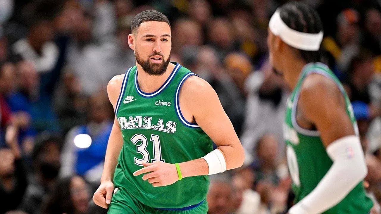 Basketball player in Dallas uniform during game