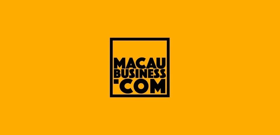 Macau Business logo on yellow background