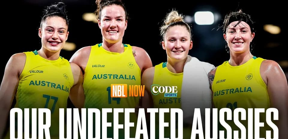Four Australian basketball players celebrating together