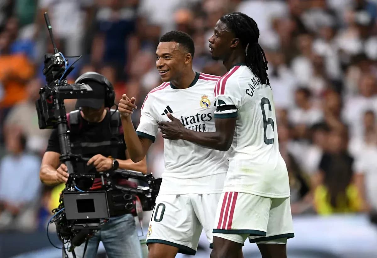 Mbappe celebrating a goal with teammate Camavinga