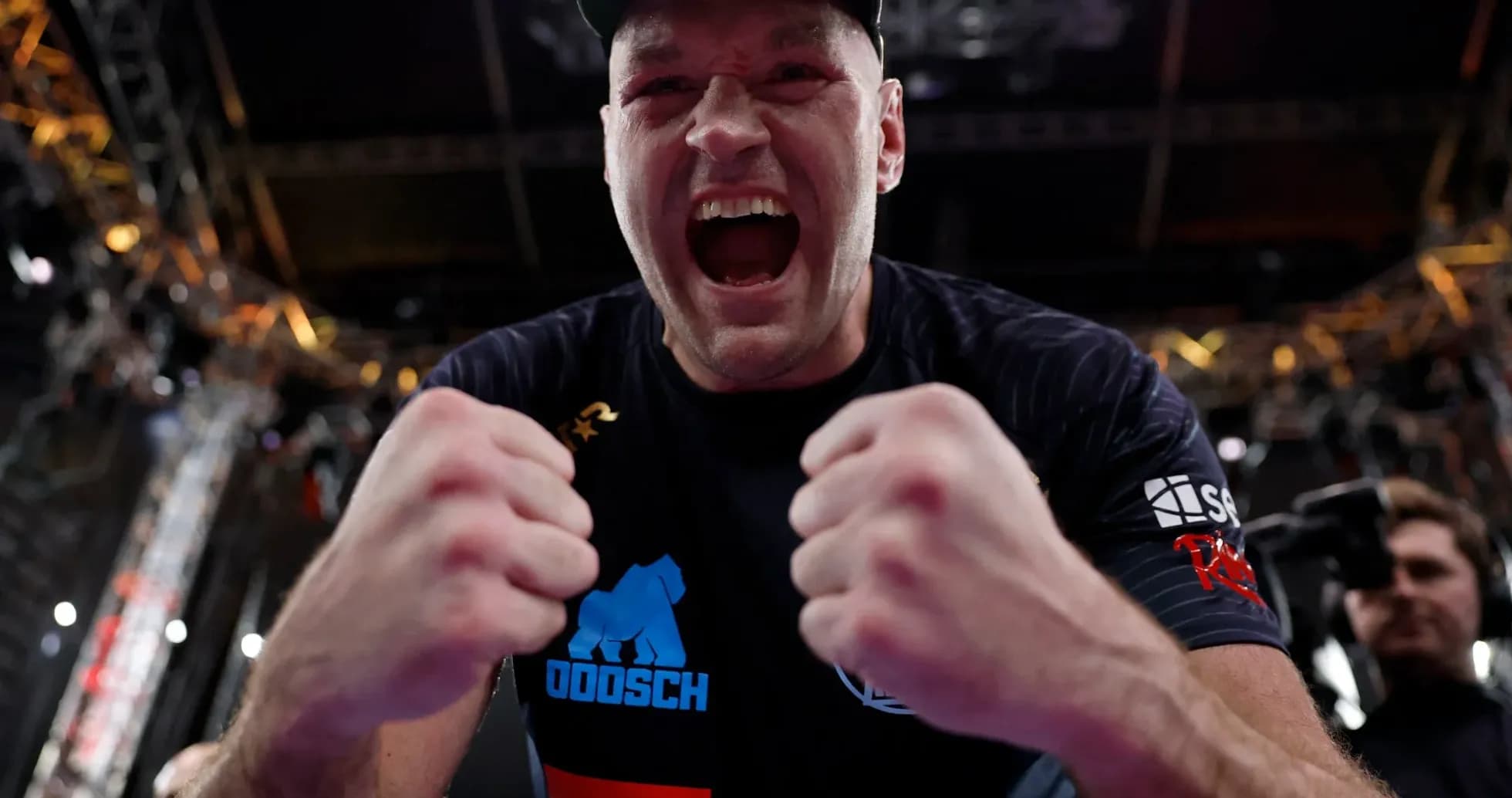 Boxer celebrating victory with clenched fists