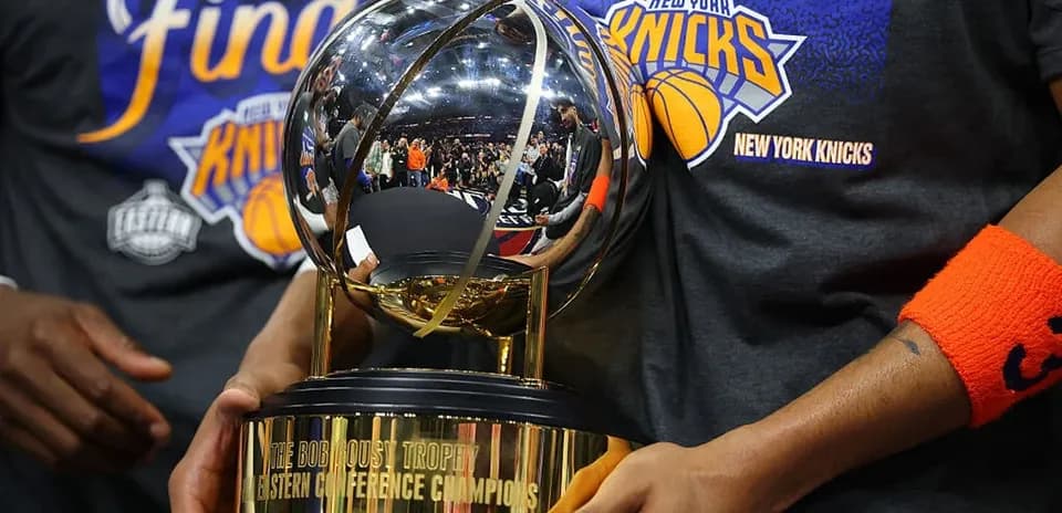 New York Knicks holding Eastern Conference trophy