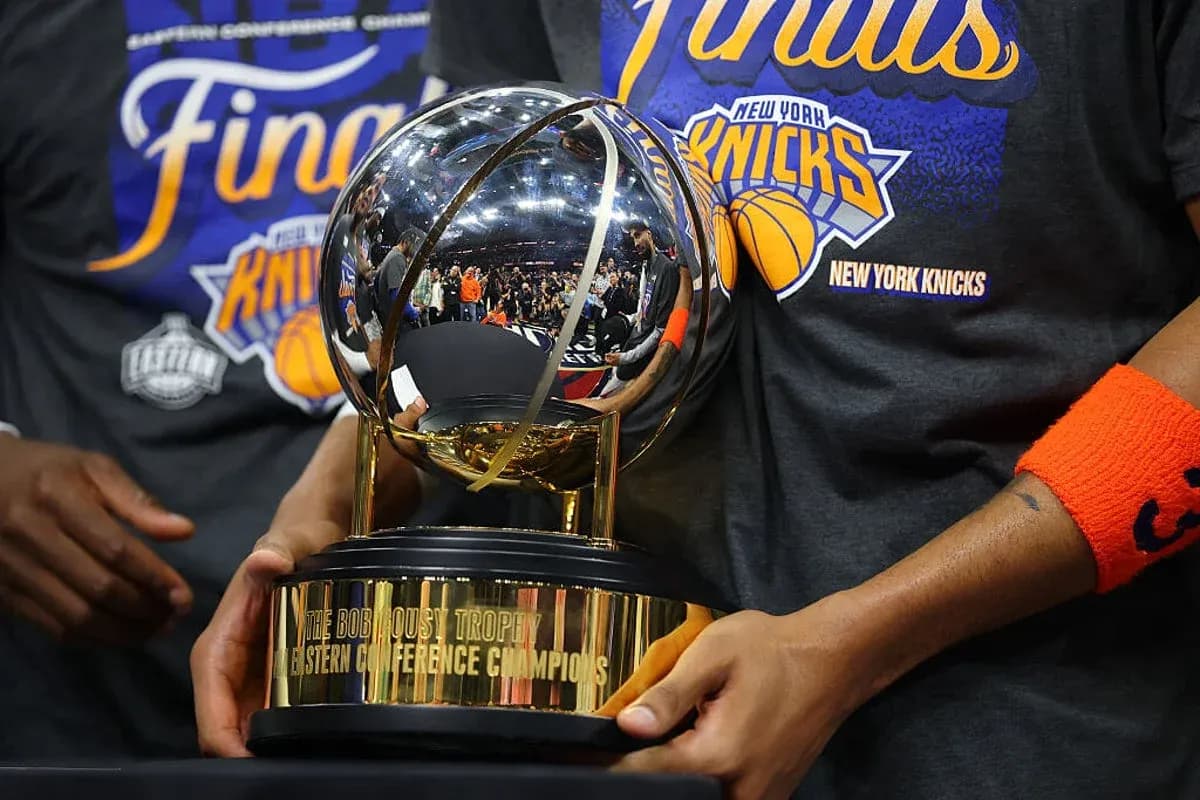 New York Knicks holding Eastern Conference trophy