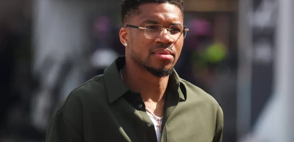 Basketball player walking in stylish outfit