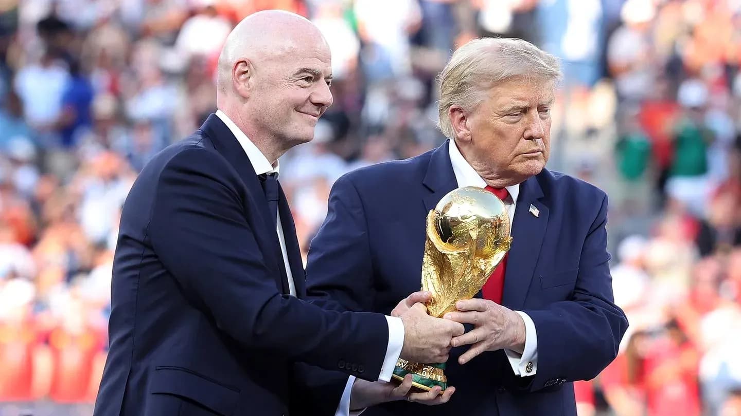 Gianni Infantino and Donald Trump with World Cup trophy