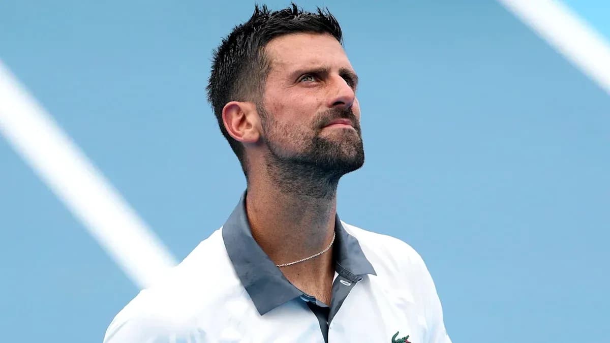 Tennis player looking up during a match