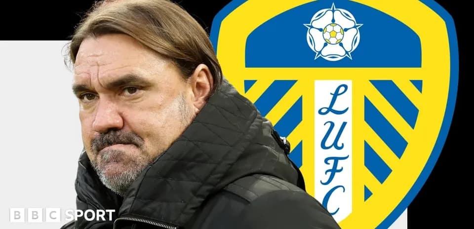 Men's football coach with Leeds United logo background