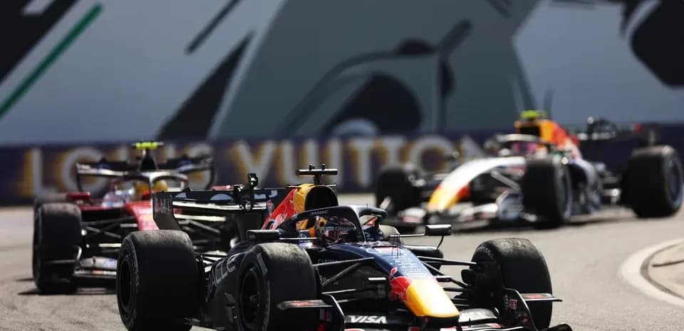 Formula 1 cars racing on track during event