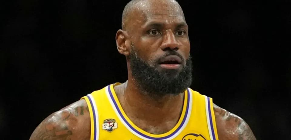 Basketball player in Lakers uniform during game