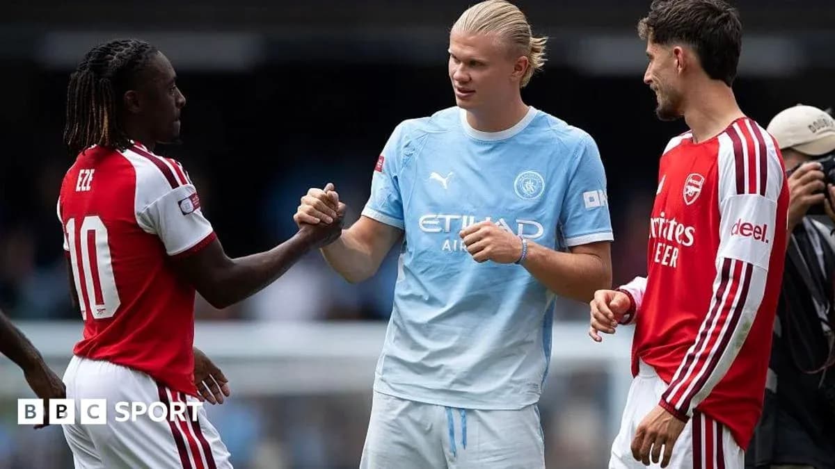 Eze and Haaland shaking hands before the match