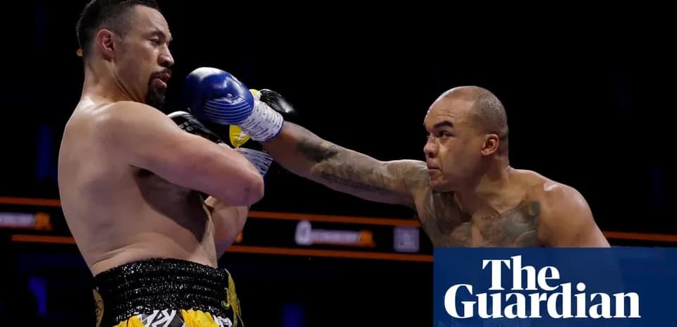 Two boxers exchanging punches in the ring